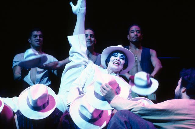 <p>Alamy</p> Chita Rivera kicks up a leg in ‘Kiss of the Spider Woman’ in 1992.