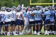 Tennessee Titans players gather during NFL football practice Thursday, June 3, 2021, in Nashville, Tenn. (AP Photo/Mark Humphrey, Pool)