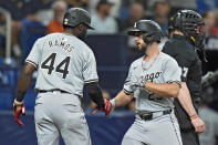 Chicago White Sox's Paul DeJong (29) celebrates with Bryan Ramos (44) after DeJong hit a two-run home run off Tampa Bay Rays starting pitcher Aaron Civale during the fifth inning of a baseball game Wednesday, May 8, 2024, in St. Petersburg, Fla. (AP Photo/Chris O'Meara)