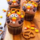 <p>Thanksgiving and turkeys go hand in hand like sweet potato and marshmallows. You can never have too many turkeys on the fourth Thursday of November. Add some adorable turkey cupcakes to your dinner table this year. </p><p><strong><em>Get the recipe at <a href="https://www.delish.com/holiday-recipes/thanksgiving/a29368652/turkey-cupcakes-recipe/" rel="nofollow noopener" target="_blank" data-ylk="slk:Delish;elm:context_link;itc:0;sec:content-canvas" class="link ">Delish</a></em>. </strong></p>