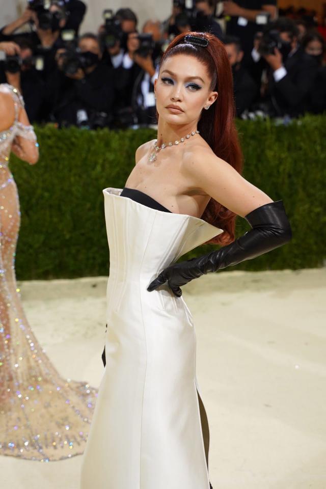 Gigi Hadid Wore a Bold Red Leather Catsuit and Corset to the 2022 Met  Gala—See Pics