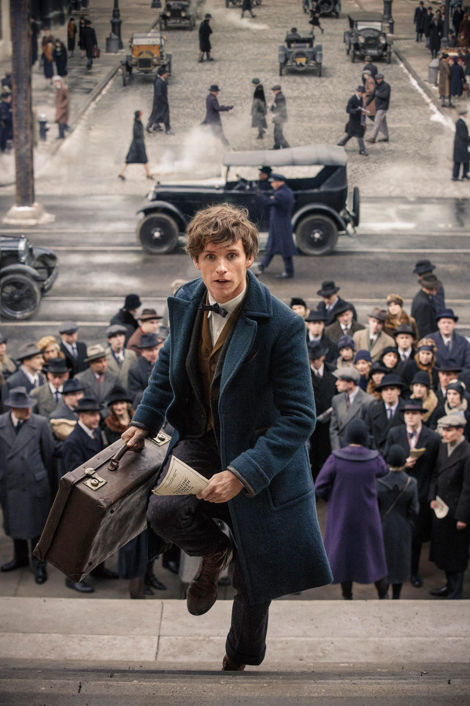 Newt Scamander scales the steps - Credit: Warner Bros.