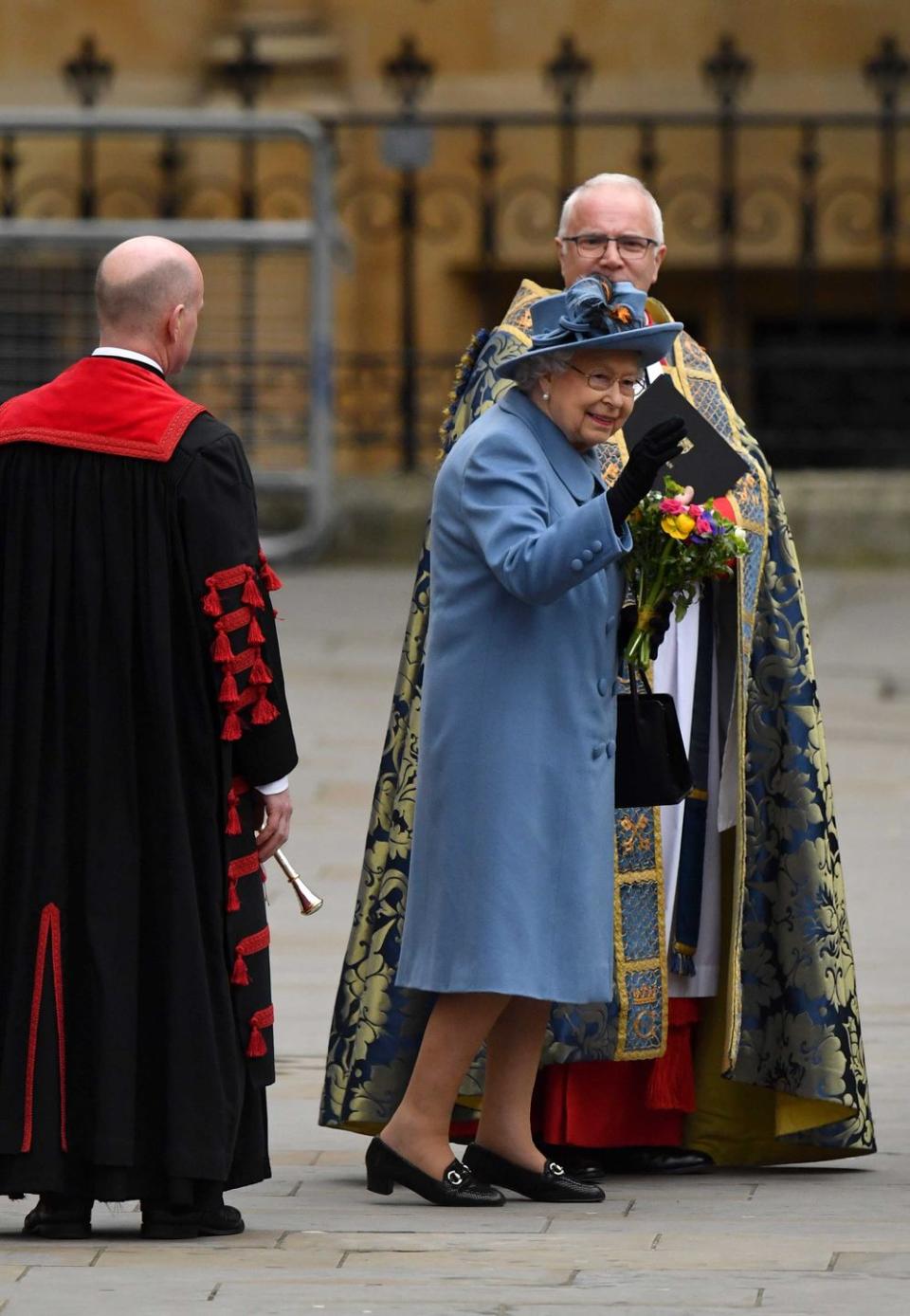 <p>The queen waves as she leaves Westminster Abbey.</p>