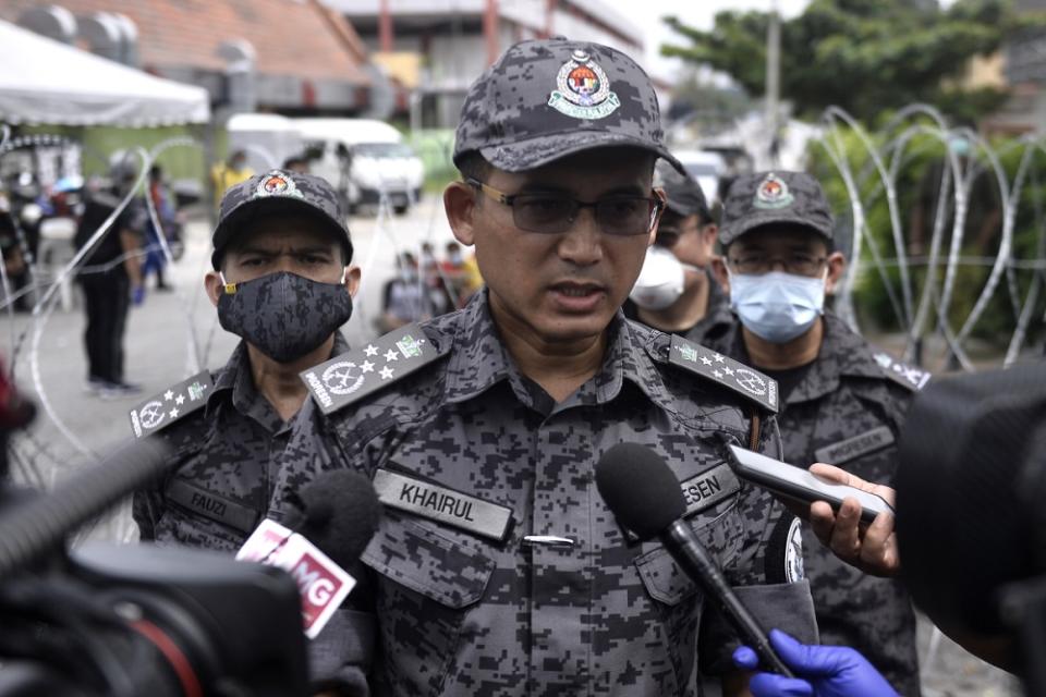 Immigration director-general Khairul Dzaimee Daud speaks to the press following a raid conducted in Petaling Jaya May 20, 2020. — Picture by Miera Zulyana