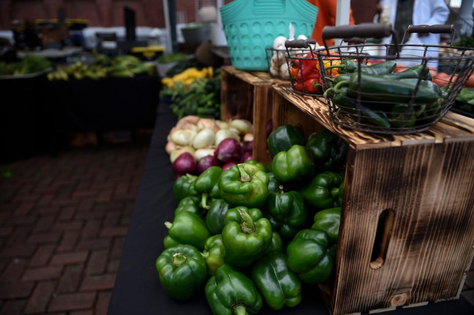 Vegetables from TOG Farms sit ready to purchase at the Augusta Farmer's Market on 8th Street on Saturday, March 18, 2023. The farmers market will be open every Saturday through November.