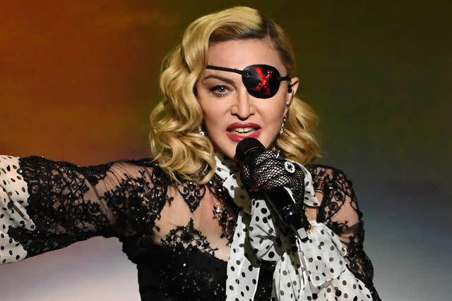 <p>Ethan Miller/Getty</p> Madonna performs in Las Vegas in May 2019
