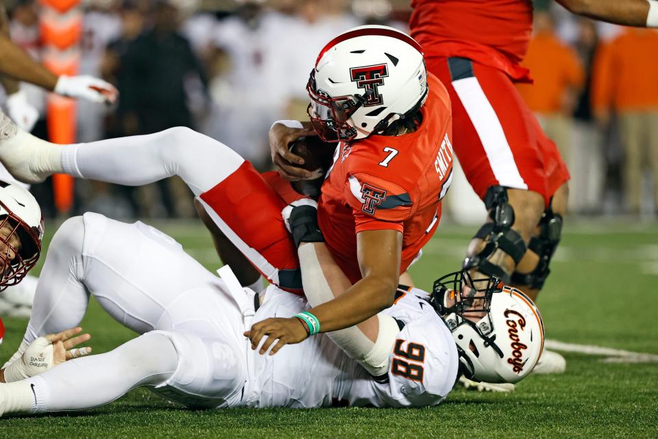Oklahoma State's Brendon Evers (98) had one of the Cowboys' four quarterback sacks on Saturday night in a 23-0 win over Texas Tech.
