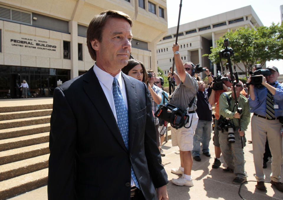 FILE - Former presidential candidate John Edwards is seen following a federal court appearance in Winston-Salem, N.C., Friday, June 3, 2011. Edwards was charged with using nearly $1 million in funds from his 2008 presidential campaign to help cover up an extramarital affair. He was acquitted of one charge, and the jury deadlocked on the others. (AP Photo/Gerry Broome, File)