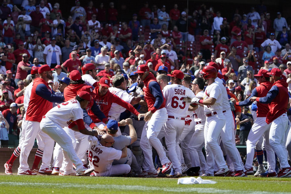 Benches clear during the eighth inning of a baseball game between the St. Louis Cardinals and the New York Mets Wednesday, April 27, 2022, in St. Louis. (AP Photo/Jeff Roberson)