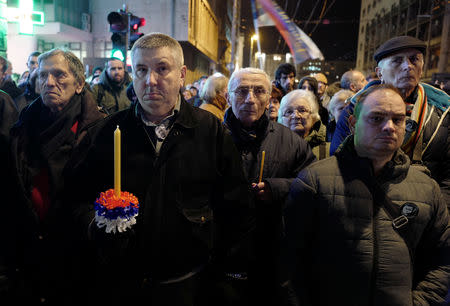People attend a march on the first anniversary of the murder of opposition Serb politician Oliver Ivanovic, in Belgrade, Serbia January 16, 2019. The murder happened in the town of Mitrovica in Kosovo. REUTERS/Kevin Coombs