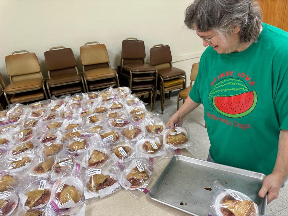 Cathy Smith works on transporting bagged pies in Quimby.