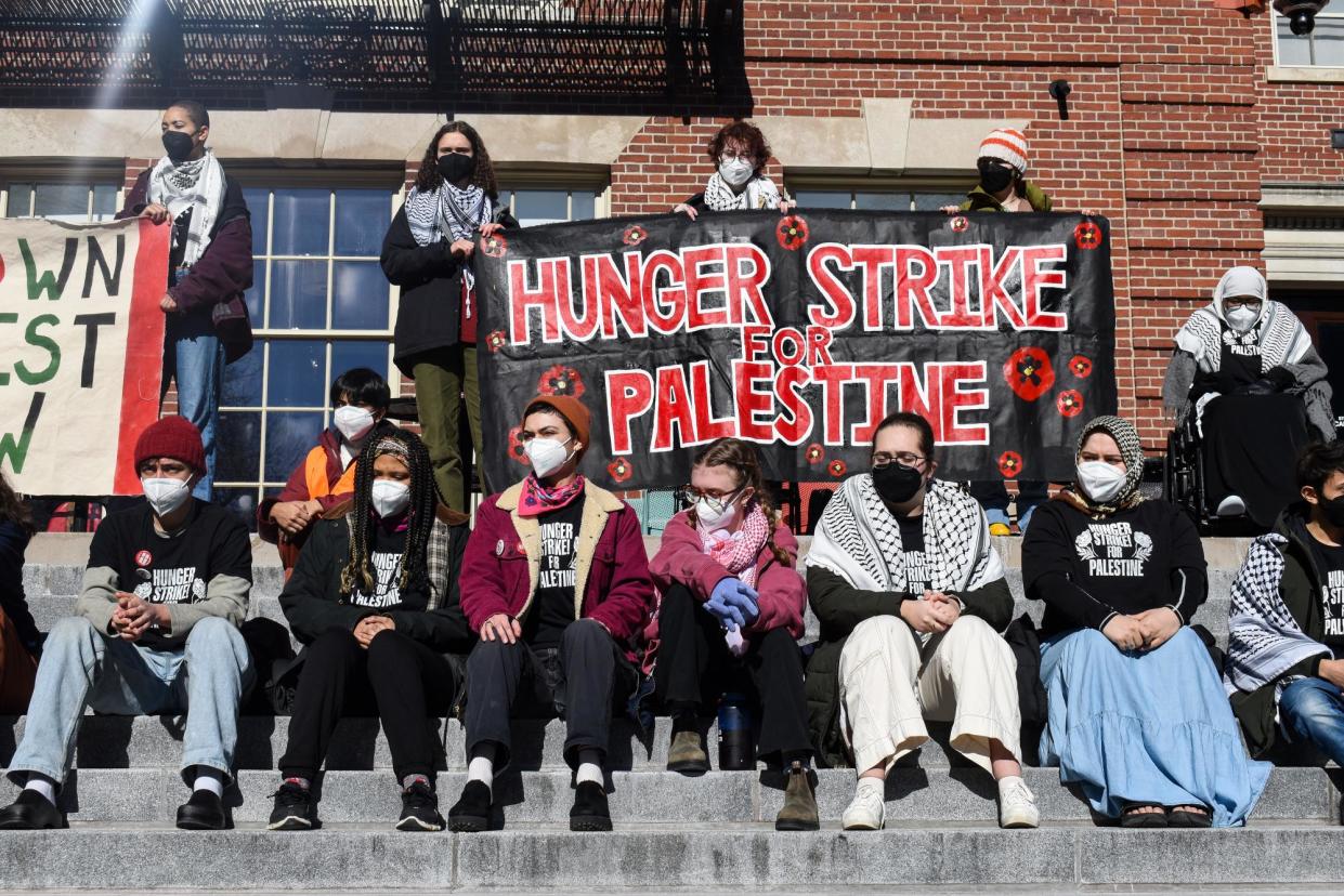 <span>Brown University students hold a hunger strike in Providence, Rhode Island, in solidarity with Palestinians, on Monday.</span><span>Photograph: Alicia Joo</span>