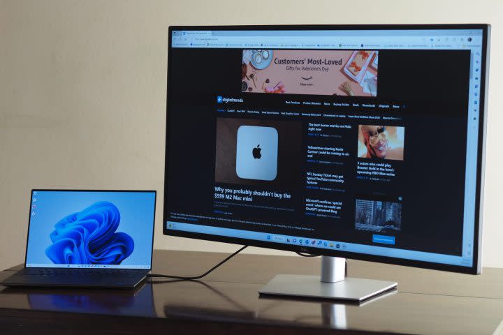 Dell UltraSharp 43 4K USB-C Hub monitor showing display and laptop.