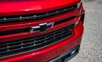 <p>The RST trim level is new for 2019 and is essentially a performance-appearance package with black bow-tie badges; LED head-, fog-, and taillights; and body-colored moldings in place of the showy chrome that adorns LTZ and High Country models.</p>