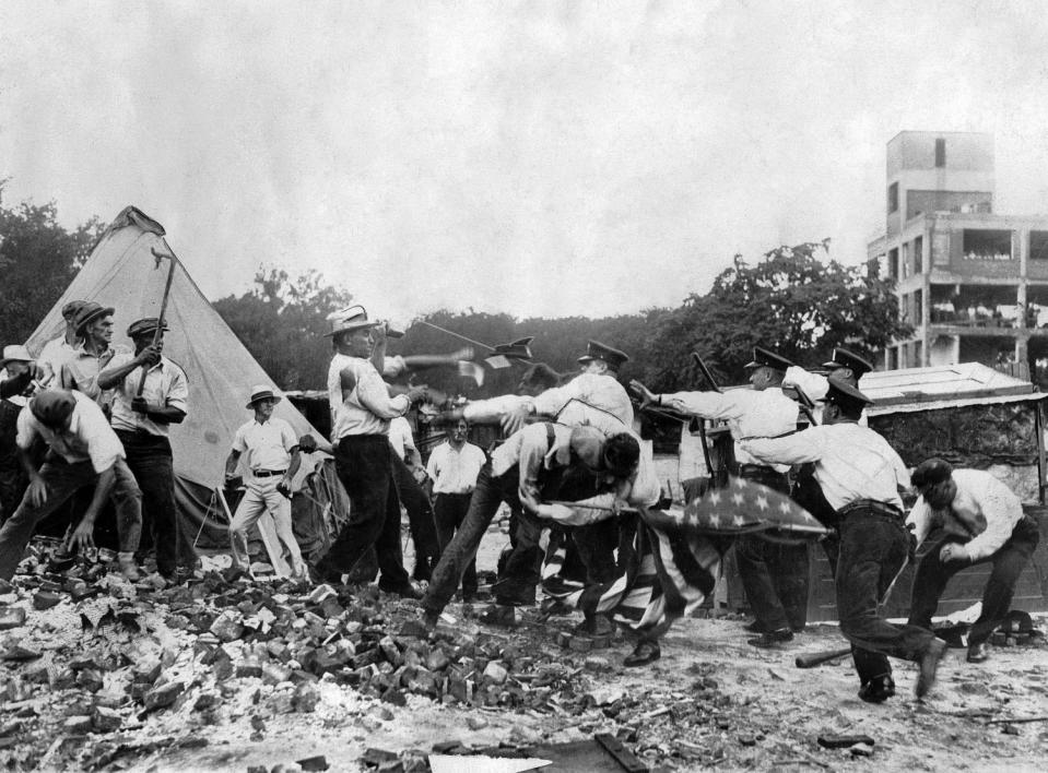 Law enforcement officials attack the Bonus Army in Washington on July 28, 1932.