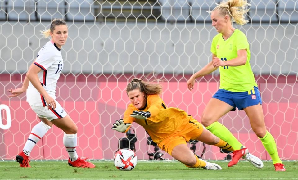 USA goalie Alyssa Naeher makes a save.