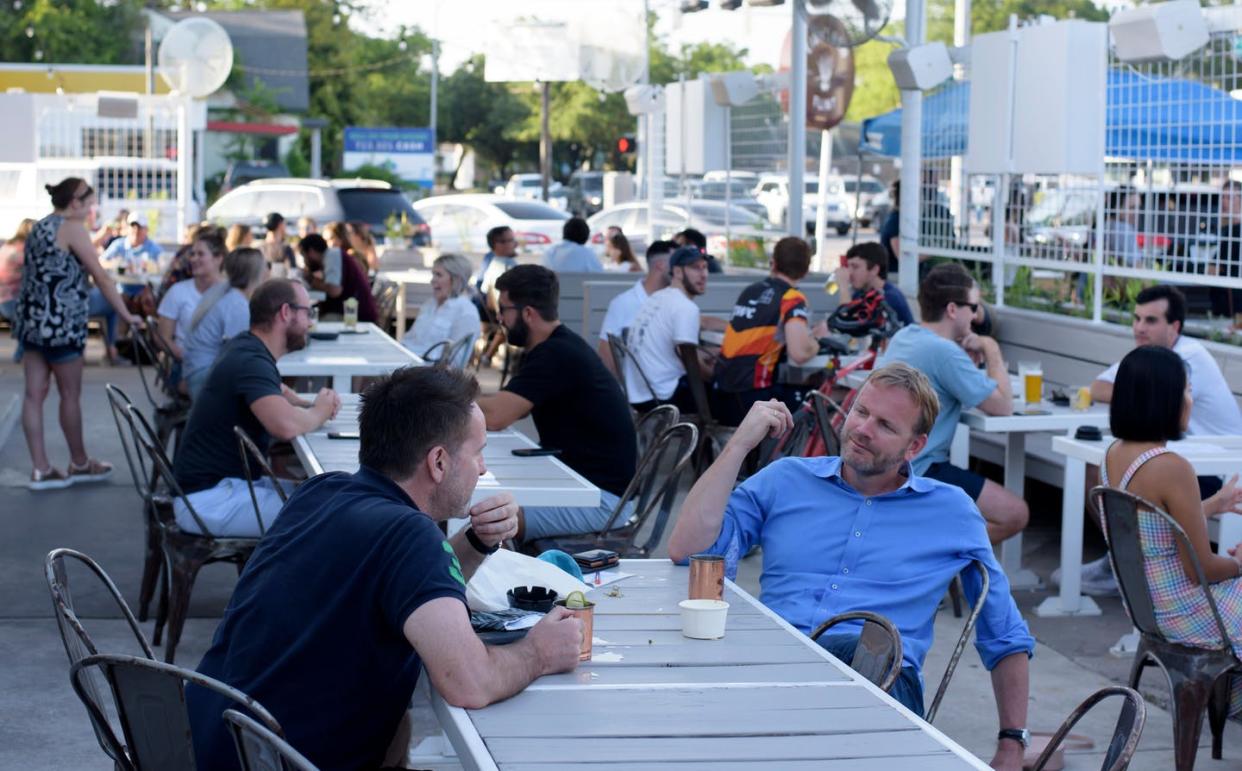 <span class="caption">On June 26, Texas' governor ordered bars to close as COVID-19 case numbers spiked, particularly among younger adults. This Houston bar, photographed in late May, <a href="https://www.facebook.com/eightrowflint/photos/a.1522124678099822/2538983929747220/" rel="nofollow noopener" target="_blank" data-ylk="slk:voluntarily shut down;elm:context_link;itc:0;sec:content-canvas" class="link ">voluntarily shut down</a> shortly before the order after two staff members tested positive for the coronavirus.</span> <span class="attribution"><a class="link " href="https://www.gettyimages.com/photos/eight-row-flint-in-houston" rel="nofollow noopener" target="_blank" data-ylk="slk:Mark Felix/AFP/Getty Images;elm:context_link;itc:0;sec:content-canvas">Mark Felix/AFP/Getty Images</a></span>