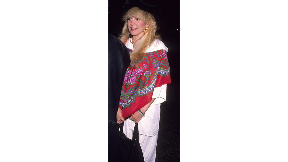 Stevie Nicks wearing colorful poncho