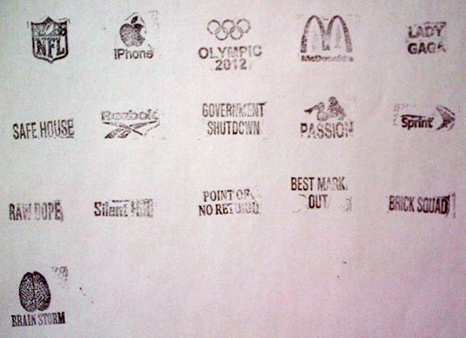 In this Jan. 30, 2014 photo provided by New York City's Office of the Special Narcotics Prosecutor, a sheet of logos allegedly used to stamp packets of heroin was found in a Bronx apartment during a police raid of the location. According to prosecutors it was a sophisticated operation, where workers with coffee grinders and scales toiled around the clock to break down bricks of heroin into thousands of tiny, hit-sized baggies, bearing such stamped brands as "Government Shutdown" and "NFL." The death of actor Philip Seymour Hoffman has once again drawn attention to a New York City heroin trade so sophisticated that getting the drug delivered to your door is nearly as easy as ordering a pizza. (AP Photo/Office of the Special Narcotics Prosecutor)