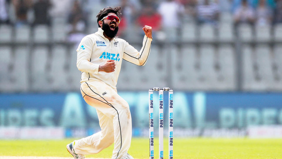 Pictured here, New Zealand spinner Ajaz Patel celebrates his historic haul against India. 