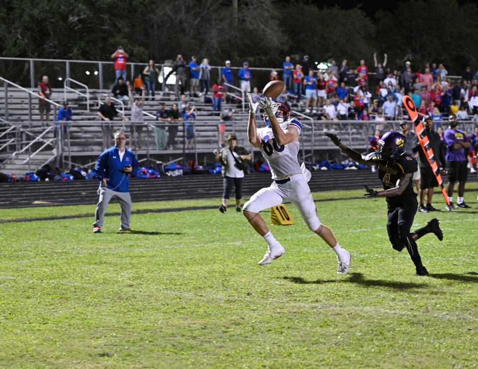 King's Academy tight end Jackson Worley makes a touchdown catch to bring the Lions' level with Boynton Beach late in a playoff game on Nov. 14, 2022 in Boynton Beach.