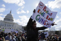 <p>Washington, DC High School student Sara Durbin joins with other students walking out of classes to demand stricter gun laws outside the U.S. Capitol in Washington, U.S., March 14, 2018. (Photo: Jim Bourg/Reuters) </p>