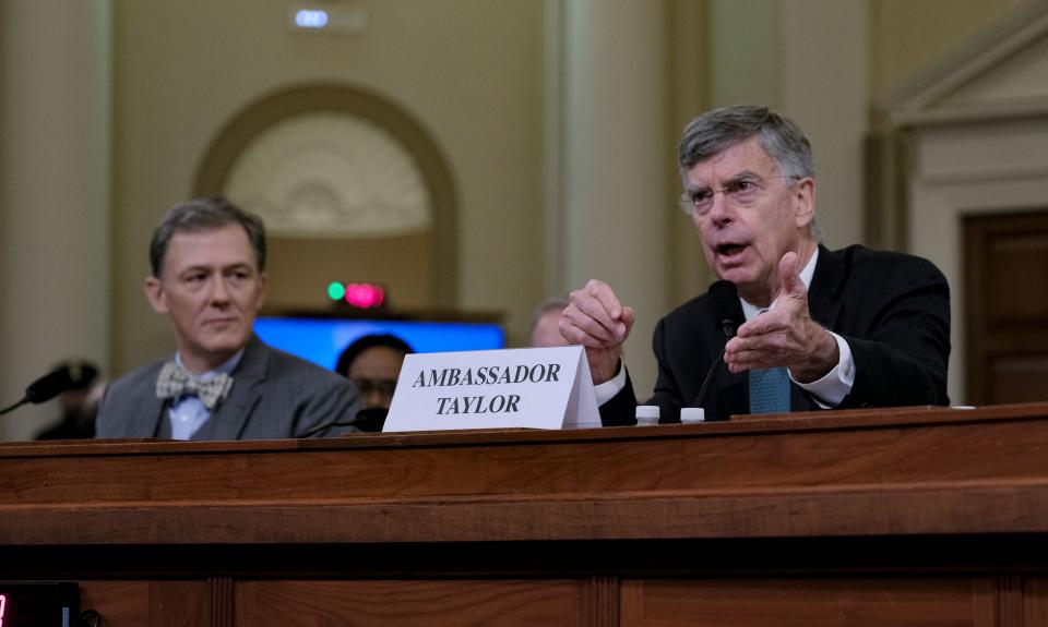 Ambassador William Taylor, right, speaks, along with George Kent, deputy assistant&nbsp;secretary&nbsp;of state for&nbsp;European and Eurasian affairs, during an impeachment inquiry in Washington, D.C., on Nov. 13, 2019. (Photo: The Washington Post via Getty Images)