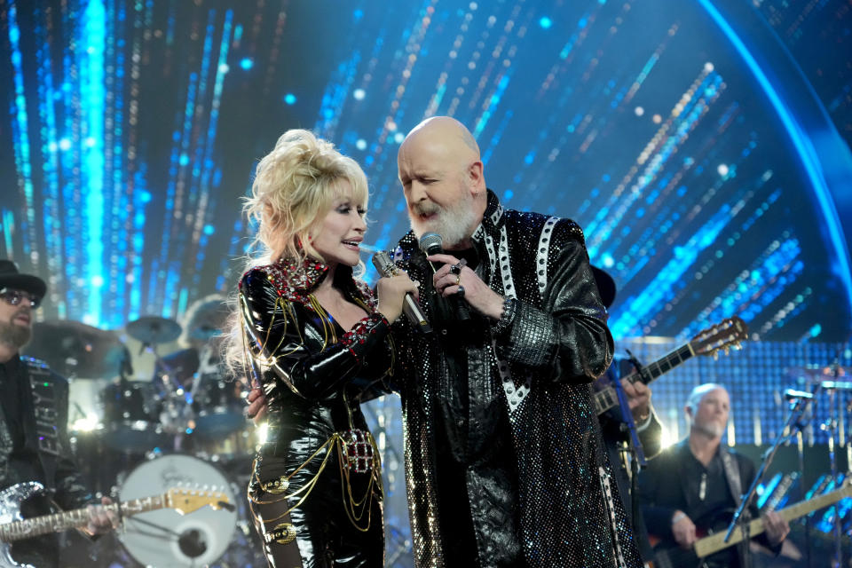 LOS ANGELES, CALIFORNIA - NOVEMBER 05: Dolly Parton and Rob Halford perform onstage durin the 37th Annual Rock &amp; Roll Hall of Fame Induction Ceremony at Microsoft Theater on November 05, 2022 in Los Angeles, California. (Photo by Kevin Mazur/Getty Images for The Rock and Roll Hall of Fame)