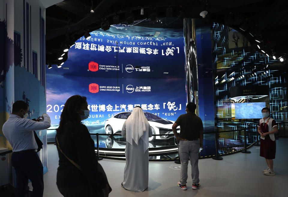 People visit the Chinese Pavilion at the Dubai Expo 2020, in Dubai, United Arab Emirates, Sunday, Oct, 3, 2021. (AP Photo/Kamran Jebreili)