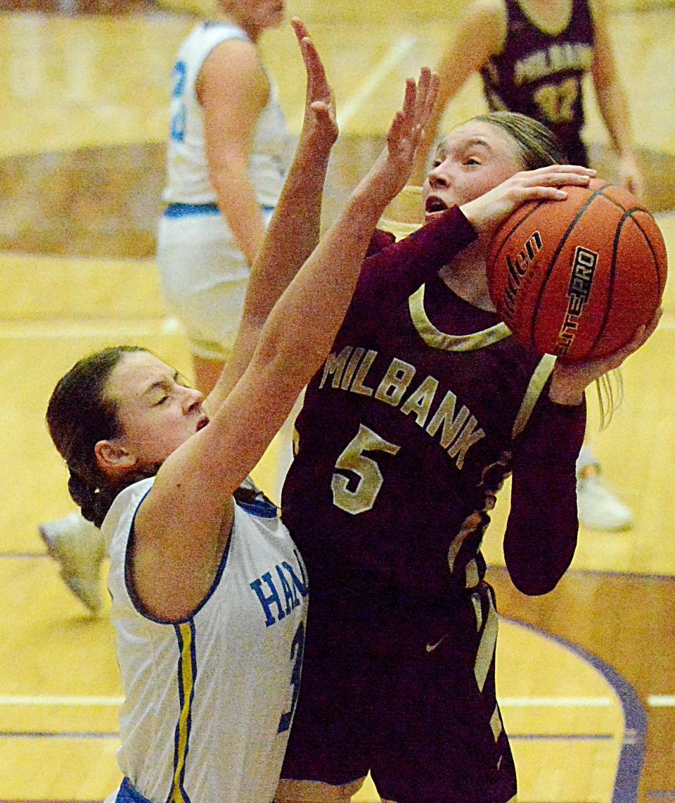 Milbank's Isabella Anderson attempts to score against Hamlin's Addie Neuendorf during their SoDak 16 Class A state-qualifying girls basketball game on Thursday, March 2, 2023 in the Watertown Civic Arena.