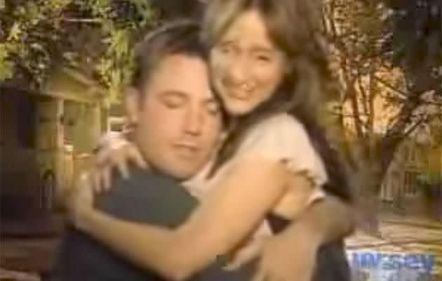 In a 2004 interview, Ben Affleck embraces Anne-Marie and nuzzles into her chest. Source: Image Diffusion International