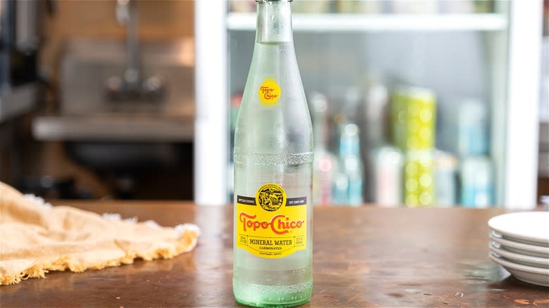 Bottle of Topo Chico sparkling water 