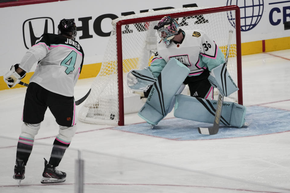 A shot from Central Division's Seth Jones, of the Chicago Blackhawks (4) gets past Pacific Division's goaltender Logan Thompson, of the Las Vegas Knights (36) for a goal in the first period of during the NHL All Star hockey game, Saturday, Feb. 4, 2023, in Sunrise, Fla. (AP Photo/Marta Lavandier)