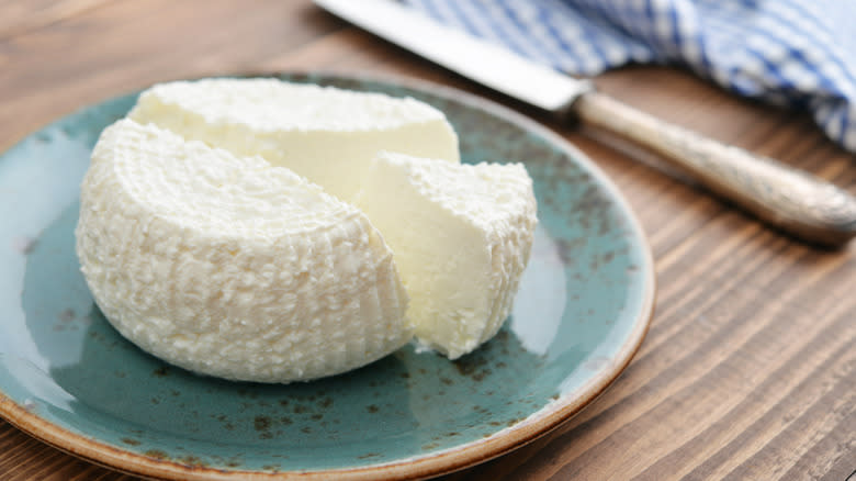 Fresh ricotta cheese on plate