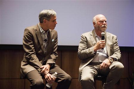 Craig Venter (R) speaks with Eric Topol, Scripps Health chief academic officer and director of the Scripps Translational Science Institute, during a symposium on "The Future of Genomic Medicine" at Scripps Seaside Forum in La Jolla, California March 6, 2014. REUTERS/Sam Hodgson