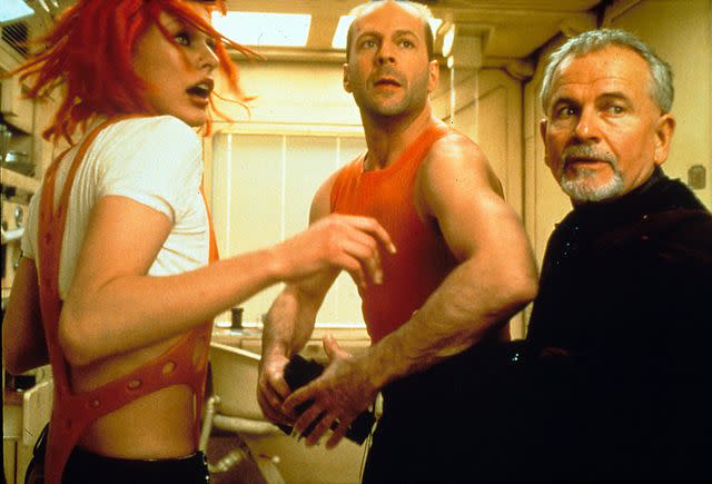 Moviestore/REX/Shutterstock (Left-right:) Milla Jovovich, Bruce Willis and Ian Holm in "The Fifth Element"