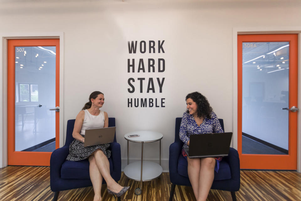 Two women at Novel Coworking's office in Alexandria, Va. Photo credit: Yale Gurney.