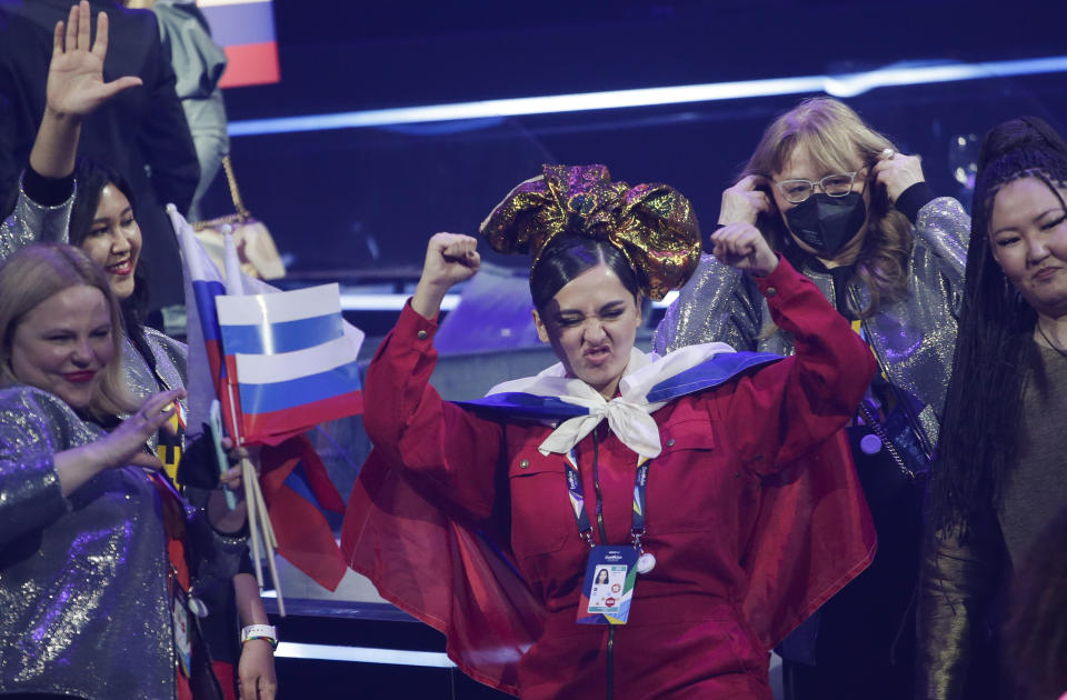 Manizha from Russia celebrates qualifying after the first semifinal of the Eurovision Song Contest at Ahoy arena in Rotterdam, Netherlands, Tuesday, May 18, 2021. (AP Photo/Peter Dejong)