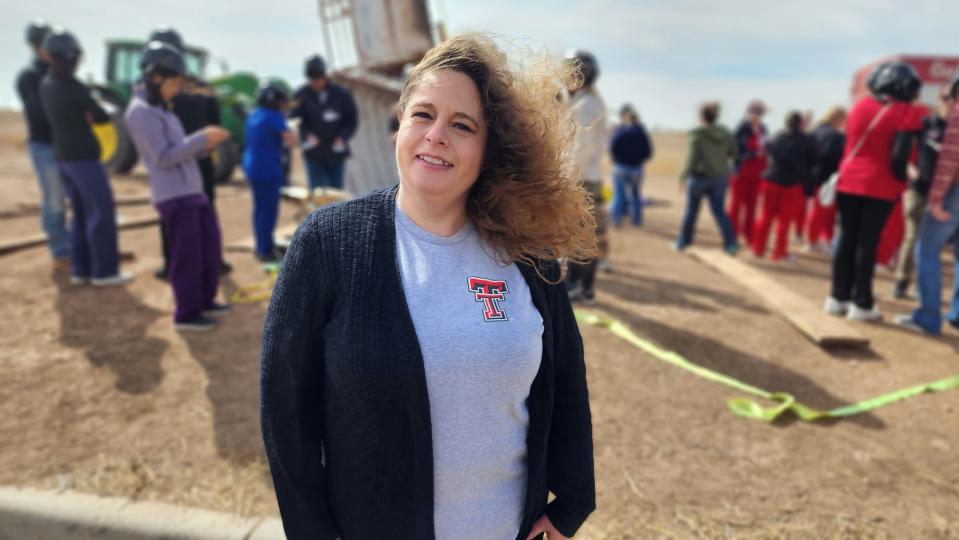 Renee Bogschutz, director of interprofessional training for TTUHSC, speaks about the downed equine scenario during Disaster Day training in Amarillo.