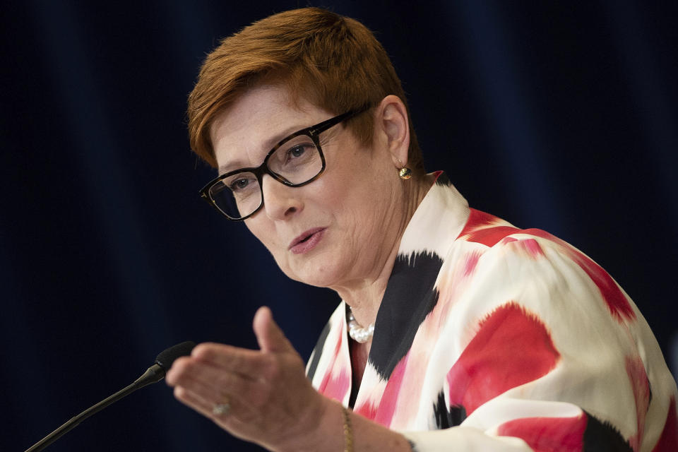 FILE - In this July 28, 2020, file photo, Australia's Foreign Minister Marise Payne speaks at a news conference at the State Department, in Washington. Australia has suspended its defense cooperation with Myanmar and is redirecting humanitarian aid because of the military takeover of the government and ongoing detention of an Australian citizen. Payne said on Monday, March 8, 2021 that Australian diplomats only had access to economic policy adviser Sean Turnell twice since he was detained in early February. She described the access as “very limited consular support.” (Brendan Smialowski/Pool Photo via AP, File)