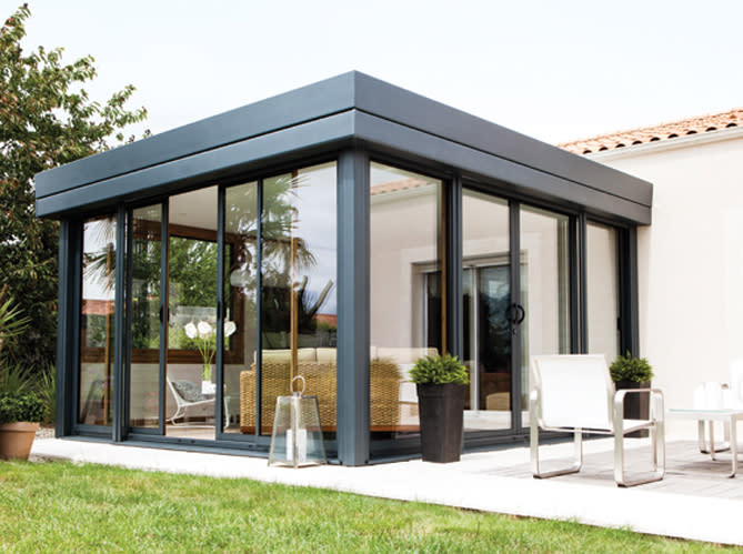 <p>Look noir pour cette jolie véranda en aluminium, un matériau star pour ce type d'extension. Abritant un petit salon, elle a le don de personnaliser la maison attenante plutôt classique. Ajoutez une extension plutôt que de refaire tout l'extérieur de sa maison, en voilà une solution !</p><p>Véranda "Rideau", <a href="https://www.gustaverideau.com/" rel="nofollow noopener" target="_blank" data-ylk="slk:Gustave Rideau;elm:context_link;itc:0;sec:content-canvas" class="link ">Gustave Rideau</a></p><br><br><a href="https://www.elle.fr/Deco/Pratique/Travaux/Agrandir/veranda#xtor=AL-541" rel="nofollow noopener" target="_blank" data-ylk="slk:Voir la suite des photos sur ELLE.fr;elm:context_link;itc:0;sec:content-canvas" class="link ">Voir la suite des photos sur ELLE.fr</a><br><h3> A lire aussi </h3><ul><li><a href="https://www.elle.fr/Deco/Pratique/Travaux/Agrandir/veranda#xtor=AL-541" rel="nofollow noopener" target="_blank" data-ylk="slk:15 jolies vérandas pour s'inspirer;elm:context_link;itc:0;sec:content-canvas" class="link ">15 jolies vérandas pour s'inspirer</a></li><li><a href="https://www.elle.fr/Deco/Exterieur/Jardin/La-pergola#xtor=AL-541" rel="nofollow noopener" target="_blank" data-ylk="slk:10 pergolas pour se protéger du soleil;elm:context_link;itc:0;sec:content-canvas" class="link ">10 pergolas pour se protéger du soleil</a></li><li><a href="https://www.elle.fr/Deco/Pratique/Travaux/Agrandir/avantages-et-inconvenients-abri-de-piscine-haut-et-veranda#xtor=AL-541" rel="nofollow noopener" target="_blank" data-ylk="slk:S'agrandir : abri de piscine ou véranda ?;elm:context_link;itc:0;sec:content-canvas" class="link ">S'agrandir : abri de piscine ou véranda ?</a></li><li><a href="https://www.elle.fr/Deco/Pratique/Travaux/Agrandir/L-amenagement-de-votre-veranda-en-5-questions-3180217#xtor=AL-541" rel="nofollow noopener" target="_blank" data-ylk="slk:L’aménagement de votre véranda en 5 questions;elm:context_link;itc:0;sec:content-canvas" class="link ">L’aménagement de votre véranda en 5 questions</a></li><li><a href="https://www.elle.fr/Astro/Horoscope/Quotidien#xtor=AL-541" rel="nofollow noopener" target="_blank" data-ylk="slk:Consultez votre horoscope sur ELLE;elm:context_link;itc:0;sec:content-canvas" class="link ">Consultez votre horoscope sur ELLE</a></li></ul>