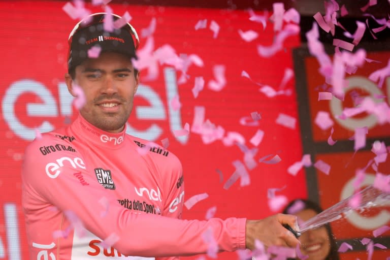 Netherlands' Tom Dumoulin of team Sunweb celebrates the Pink Jersey of the overall leader on the podium after the 18th stage of the 100th Giro d'Italia, Tour of Italy, cycling race from Moena to Ortisei on May 25, 2017