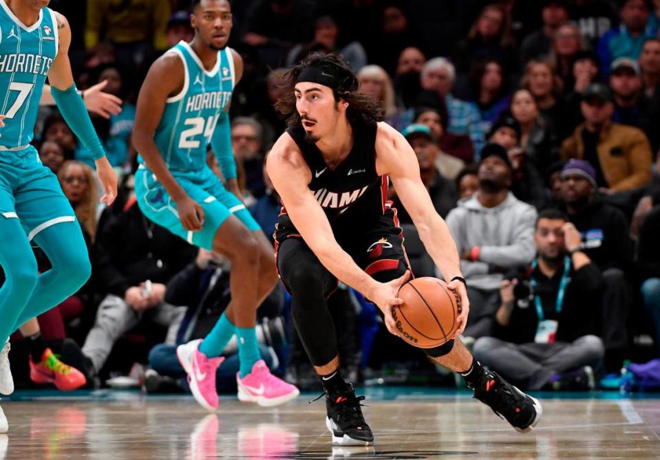 Miami Heat forward Jaime Jaquez Jr. (11) gets a loose ball during the second half against the Charlotte Hornets at the Spectrum Center.