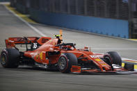 Ferrari driver Charles Leclerc of Monaco steers his car during the qualifying round for the Singapore Formula One Grand Prix at the Marina Bay City Circuit in Singapore, Saturday, Sept. 21, 2019. (AP Photo/Vincent Thian)