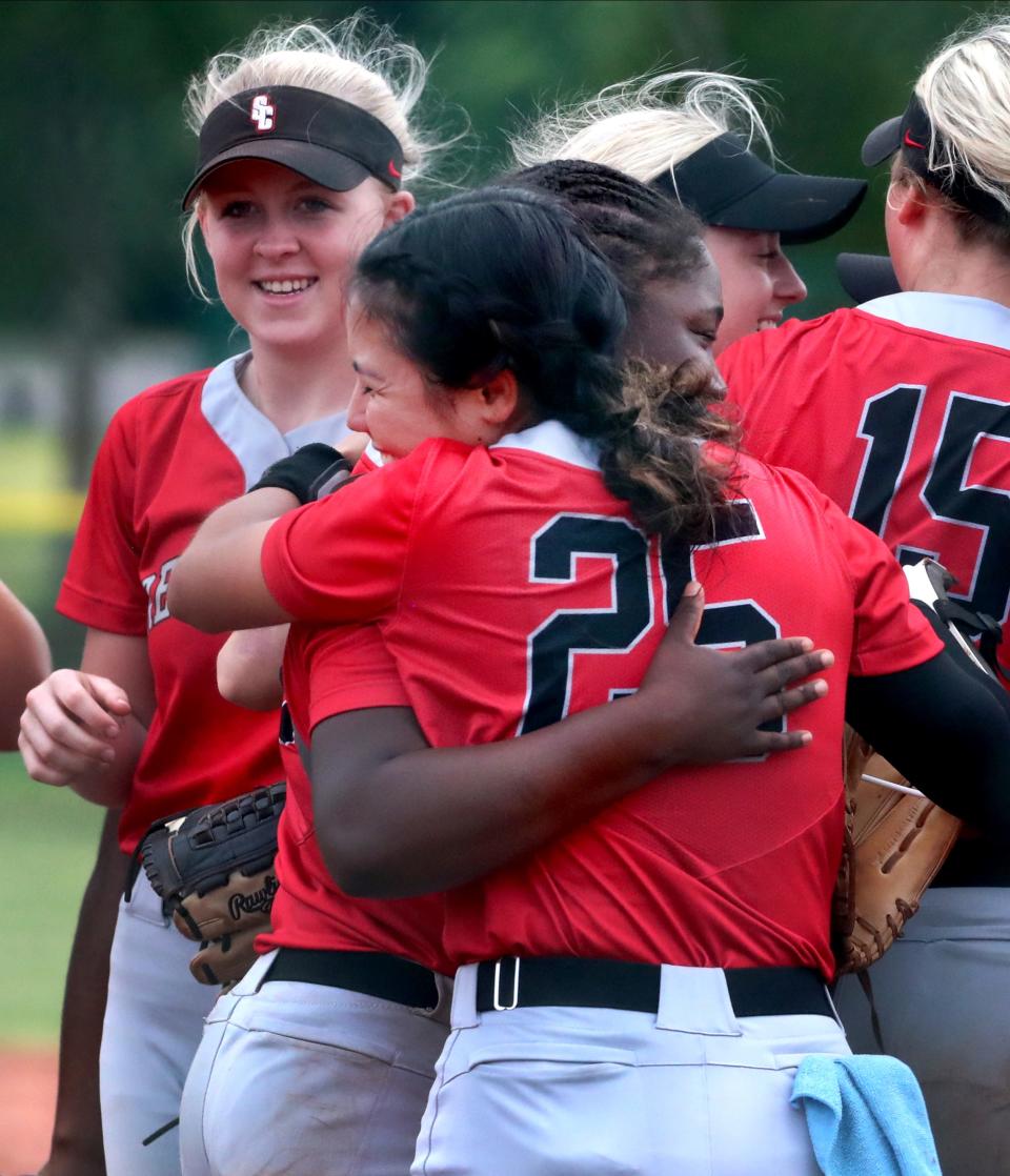 Stewarts Creek's pitcher Grace Fujino (25) and Stewarts Creek's catcher Brooke Ramsey (21) hugs after beating Coffee County during the 2022 Division 1 Class 4A State Softball Tournament on Wednesday, May 25, 2022.