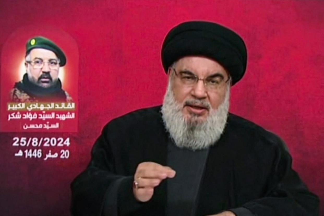 An image grab taken from Hezbollah's al-Manar TV on August 25, 2024, shows Lebanon's Hezbollah chief Hassan Nasrallah giving a televised address from an undisclosed location (Al-Manar/AFP via Getty Images)