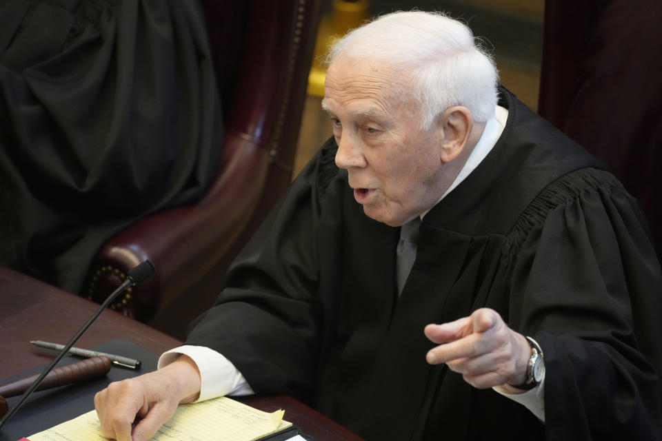 Mississippi Supreme Court Presiding Justice James W. Kitchens, asks a question of lawyers during their arguments on the constitutionality of a Mississippi law that would authorize some judges who would be appointed in a state where most judges are elected, Thursday, July 6, 2023, before the court in Jackson, Miss. (AP Photo/Rogelio V. Solis)