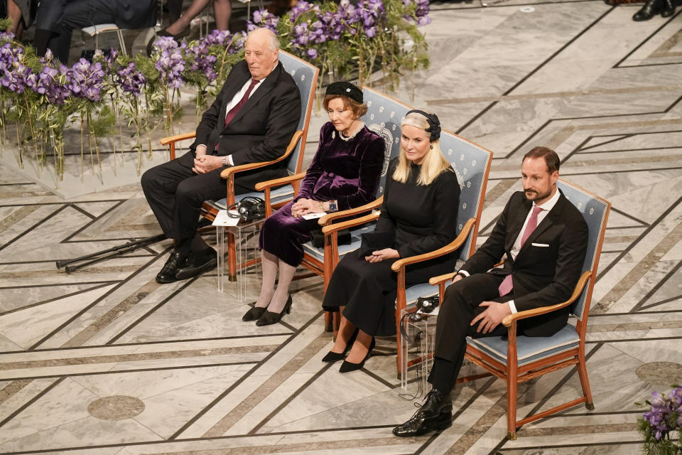 Norway's King Harald, left, Queen Sonja, second left, Crown Princess Mette-Marit and Crown Prince Haakon during the awarding of the Nobel Peace Prize for 2023 in Oslo City Hall, Oslo, Norway, Sunday, Dec. 10, 2023. The children of imprisoned Iranian activist Narges Mohammadi are set to accept this year’s Nobel Peace Prize on her behalf. Mohammadi is renowned for campaigning for women’s rights and democracy in her country. (Fredrik Varfjell/NTB via AP)