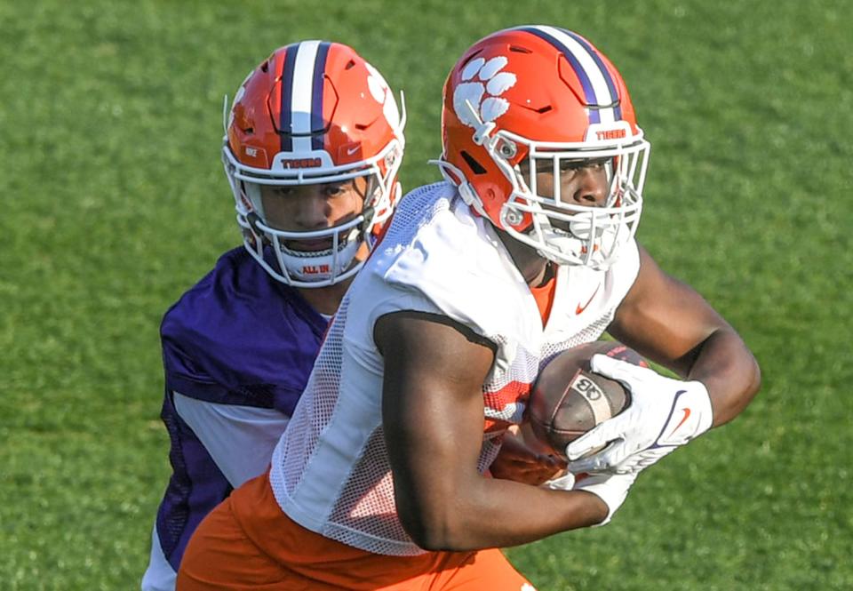 Phil Mafah takes a handoff from D.J. Uiagalelei last week during the first day of spring practice.