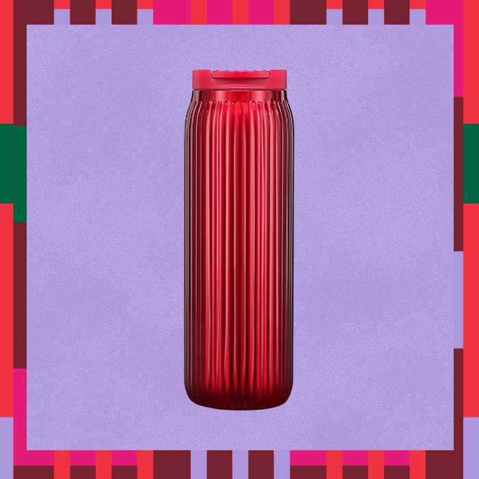 The Deep Red Pleated Tumbler, part of the Starbucks holiday cup lineup.